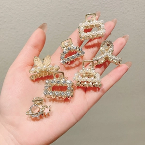 Elegant gold metal hair claws set with pearls and rhinestones in various shapes