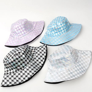 Houndstooth laser reflective bucket hats in vibrant holographic pink and blue finishes