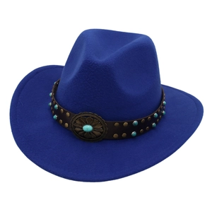 Close-up of blue felt cowboy hat with leather band and turquoise stone ornaments