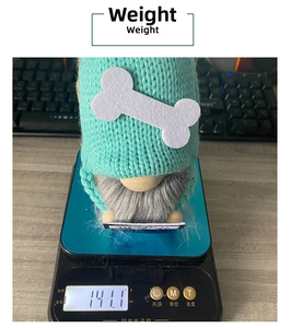 Detailed view of handmade Christmas gnome plush showing weight measurement of 141.1g