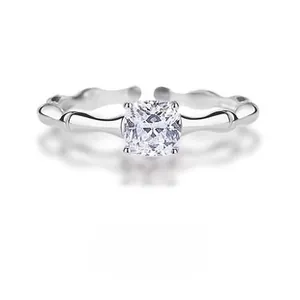 Macro shot of S925 silver ring featuring bamboo texture band and cushion-cut zircon stone