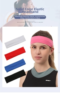Close-up of elastic moisture-wicking sports headbands in pink, white, red, blue, and black