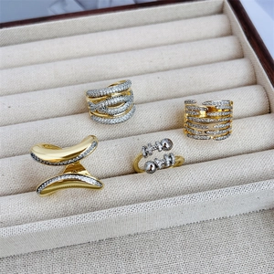 Luxurious 18K gold plated mesh butterfly and bone shaped rings with zircon stones