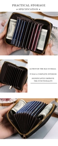 Detail of the multi-slot concertina card holder with a golden zipper and leather texture