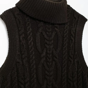 Deep brown high neck sleeveless knit vest featuring a chunky cable knit pattern for women