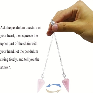 Macro detail of pink rose quartz hexagonal pendulum with silver chain for healing
