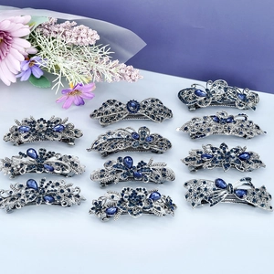 Lot de 11 barrettes vintage en métal argenté avec strass bleus, motifs fleurs et papillons