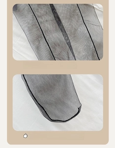 Detail view showing the reinforced heel and seamless toe of black mesh bow socks