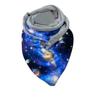 Detail of infinity scarf featuring dark blue galaxy print and metal button closure