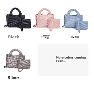 Detail of woven bucket bag sets in black, pink, blue, and silver with chain straps