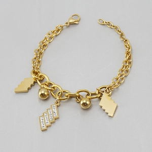 Bracciale a doppio strato in acciaio inossidabile dorato con ciondoli geometrici e cristalli