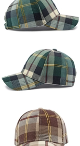Detail of plaid baseball cap texture and premium stitching on curved brim fabric