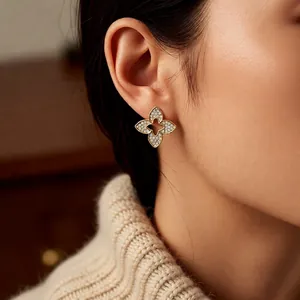 Exquisite gold plated flower stud earrings with sparkling cubic zirconia for women