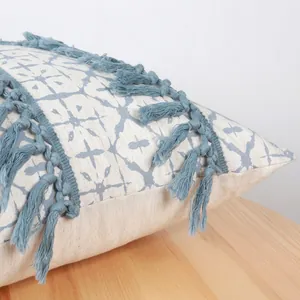 Blue geometric print cushion cover with tassels made of cotton linen fabric