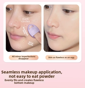 Detail showing mini purple finger puff concealing dark circles and acne marks on skin