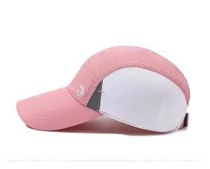 Side view of pink quick-dry baseball cap featuring breathable white mesh panels