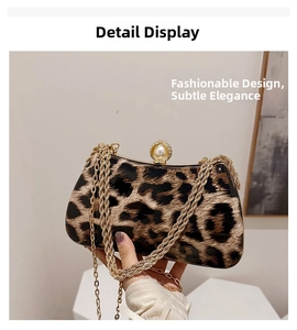 Close-up of leopard print clutch with pearl rhinestone clasp and gold chain strap
