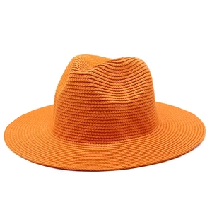 Classic summer Panama straw hat in bright orange with breathable spiral woven texture