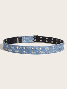 Close-up of light blue denim belt featuring double-row star metal rivets and silver buckle