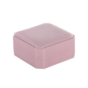 Detail view of the octagonal pink velvet jewelry box showing soft texture and cut corners