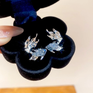 Exquisite silver goldfish earrings with zircon stones in a black floral jewelry box
