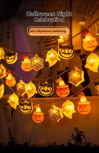 Close-up of glowing LED pumpkin, ghost, and spider web string lights for Halloween decor