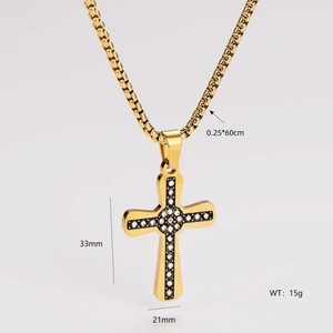 Detail view of gold cross pendant with dimensions 33mm by 21mm and 60cm chain specs