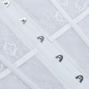 Close-up of white lace bodice detail showing high-quality fabric and metal busk closures