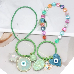 Colorful Evil Eye beaded phone charms with Good Luck star and heart-shaped resin pendants