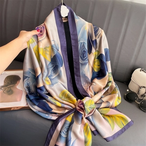 Elegant large blue floral satin shawl with detailed rose print and silky glossy finish