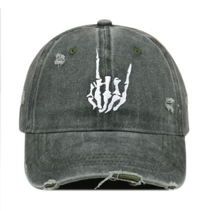 Distressed charcoal baseball cap featuring a white skull gesture embroidery and ripped details