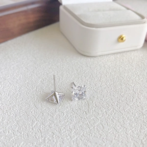 Detailed close-up of S925 sterling silver stud earrings with square-cut cubic zirconia