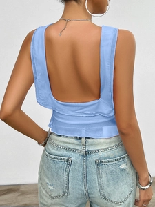 Detail view of the Y2K blue mesh backless camisole top showing the elegant cutout design