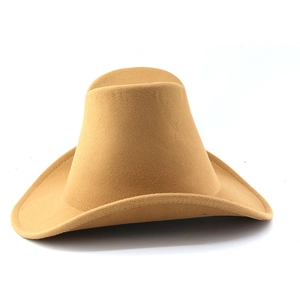 Detail view of ginger yellow western cowboy hat with high crown and curved brim