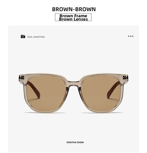 Front view of square brown sunglasses with wood grain temples and tinted lenses