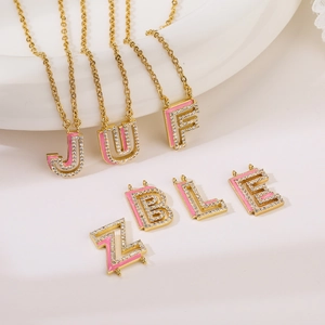 Gold-plated letter necklaces with pink enamel border and sparkling rhinestones for women
