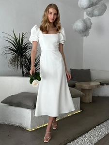 Elegant white square neck puff sleeve midi dress with slim fit and A-line silhouette