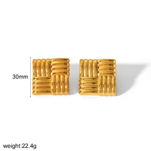 Detailed view of 18k gold plated square earrings with textured weave pattern and 30mm size