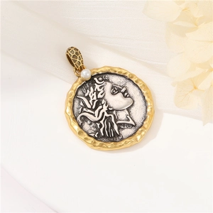 Macro shot of retro Greek relief coin pendant with gold border and pearl accent