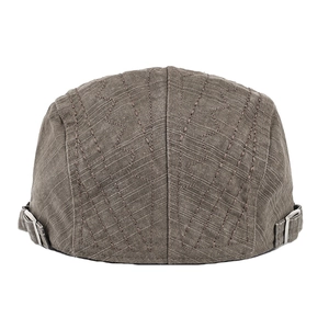 Detail view of cotton flat cap back with decorative zigzag stitching and metal buckles