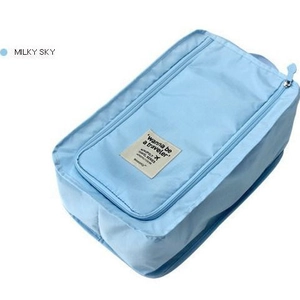 Waterproof travel shoe storage bag in Milky Sky blue with zipper and nylon texture