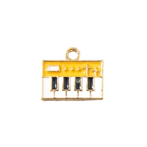 Miniature piano keyboard charm in yellow and white enamel with gold alloy frame