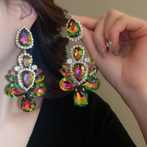 Detailed view of oversized drop earrings with colorful multi-hue crystals and micro-pave setting