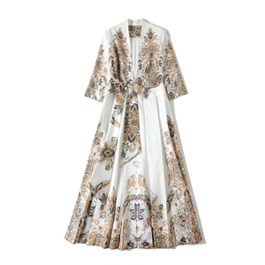Vestido vintage francés con cuello en V, estampado elegante y cinturón de lazo