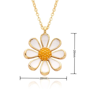 Detail showing a 20mm daisy pendant with white petals, yellow center, and gold necklace