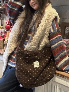 Brown fuzzy plush shoulder bag with heart patterns and wide strap for winter
