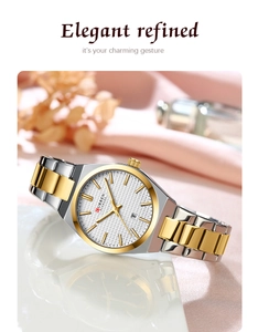 Macro detail of Curren ladies' watch with silver-gold two-tone steel strap and white dial