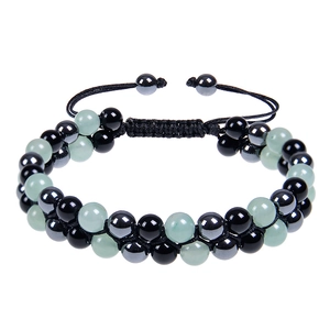 Detail of 8mm double-layer braided bead bracelet with amethyst and magnetic stones