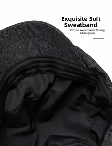 Detail of the inner black cotton sweatband and premium lining of the denim newsboy cap