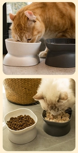 Detail showing white and dark grey elevated cat bowls with neck protection design